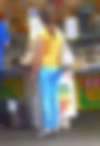 Milf's little booty in tight blue jeans at the street market creepshot