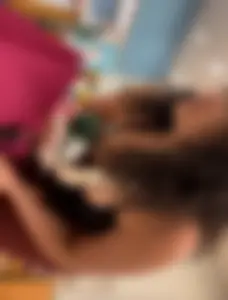 Cute girl in maroon leggings w cleavage