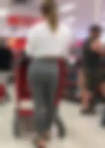 Sexy lady shopping at Target with a big ass in grey leggings