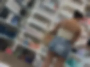 Extremely Hot Latina in Mini Skirt Showing Big Cheeks