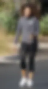 Beautiful black girl in Nike leggings in the parking lot