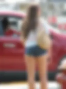 Denim short babe with a wedgie showing some cheeks