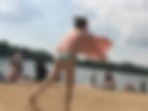 A Hot Candid Milf in a Swimsuit Playing Ball at the Beach Creepshots Gallery