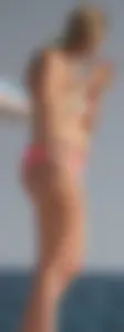 Thick blonde bikini babe on the beach