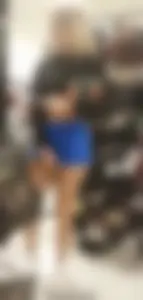 Girls in tight shorts in a shop