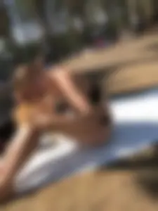 Ginger Girl in a Swimsuit Fixing Her Hair on a Lake Beach Creepshots - Great Legs