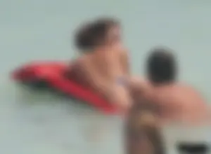 A bunch of sexy beach voyeur babes in bikinis, thongs and topless