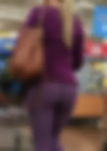 Sexy blonde shopping at Walmart in purple leggings with some vpl