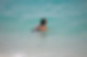 Assortment of sexy babes at the beach in bikinis
