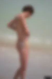 A bunch of sexy beach voyeur babes in bikinis, thongs and topless