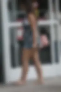 Thick girl in romper shorts going into TJ Maxx gives a cheek peak