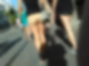 Brunette ass cheeks in short yellow shorts