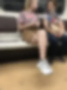 Amazing Hot Girl in a Skirt and Sneakers Sitting Cross-Legged in the Subway Train and on the Escalator Candid Photos Gallery