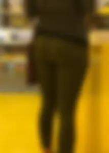 Milf with a nice ass in tight green leggings