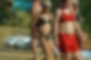Group of Girls in Swimsuits Walking on the Beach Candid Photo Gallery