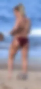 Hilary Duff in maroon bikini on the beach with a big booty