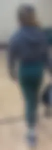 Tiny Asian leaving the gym in green leggings
