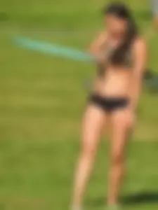 Fit brunette posing in the park. With hoops! [011]