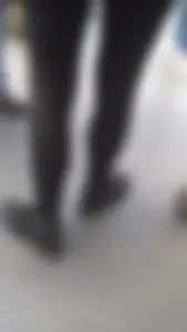 Girl wearing a black skirt over her leggings