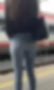 Tight jeans ass at train station