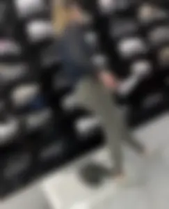Sports store blonde worker in nice leggings