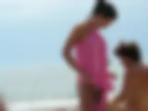 Perfect bodied beach girl topless and in thong bikini