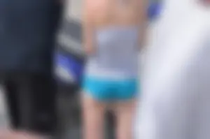 Skinny babe with a cute little ass in tiny blue shorts