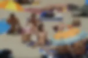 Girls on a nude beach in Sitges, Spain