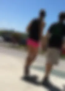 Sexy girl with a nice ass in tight pink spandex shorts