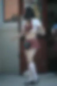 Two sexy Tilted Kilt employees showing cleavage and cheeks