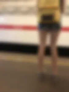 Cute Skinny Teen in Jean Mini Shorts Standing on the Subway Platform