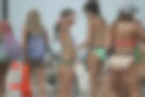 Saint Patrick's Day girls in bikinis at Deerfield Beach in Florida