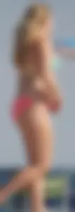 Thick blonde bikini babe on the beach