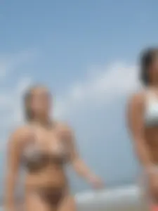 Stalking the busty girl on the beach