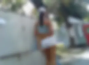Sexy Girl in a Top and Shorts on Roller Blades - Street Candid Photo Gallery With Ass Closeups