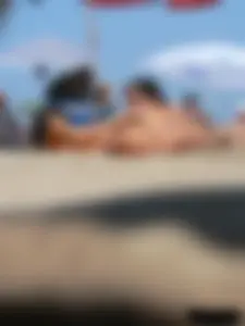 2 topless thonged sexy friends on the beach with great bodies