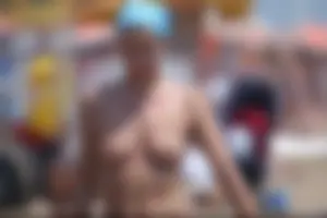 Girls on a nude beach in Bibione, Italy