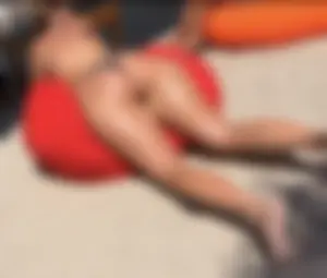 Large collection of hot beach girls lying on the beach and bending over