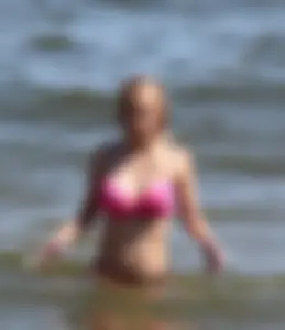 Two sexy beach teens in bikinis, one thick and one skinny with big boobs