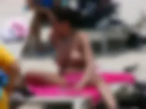 Sexy candid topless and nude beach girls