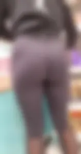 Blonde squatting with nice ass packed in leggings