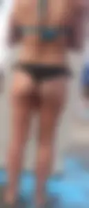 Beach shower milf in semi thong bikini with a nice ass