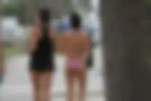 Saint Patrick's Day girls in bikinis at Deerfield Beach in Florida
