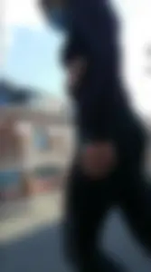 Girl in Tight Walking Down a Street Closeup Creepshots Series