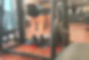 Cute gym teen in grey shorts working out with a friend + bonus shots