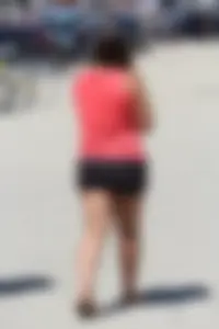 Thick girl in pink top and black shorts with vpl