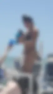 Two girls in thongs at the beach (OC)