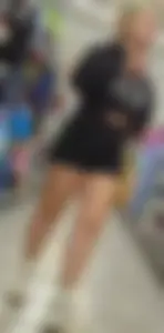 Blonde girl in black shorts