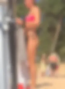 Swedish beach babe in pink and black bikini