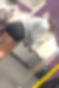 Beautiful gym asian (?) slightly bent over